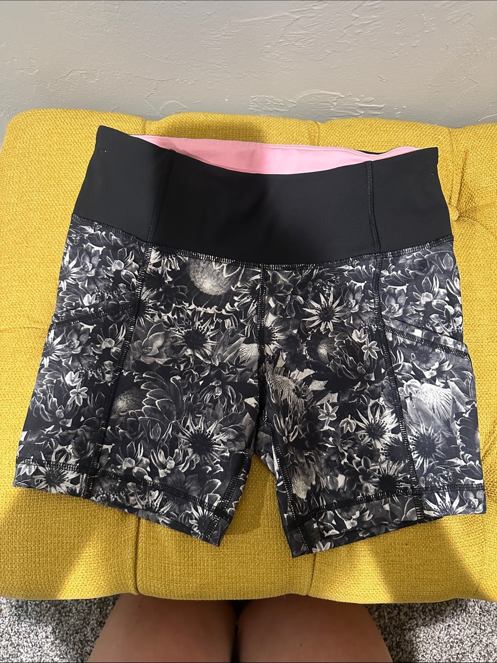 lululemon athletica Black Floral Print Bike Shorts with Pink Waistband.